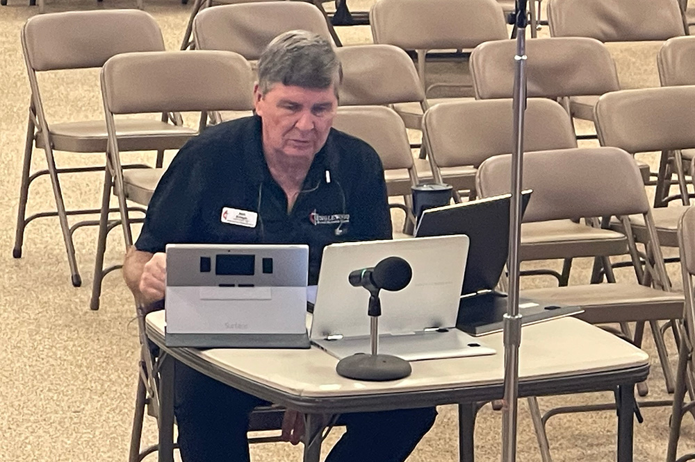 Rick Krieger operating the live stream system at a contemporary worship service at EMC